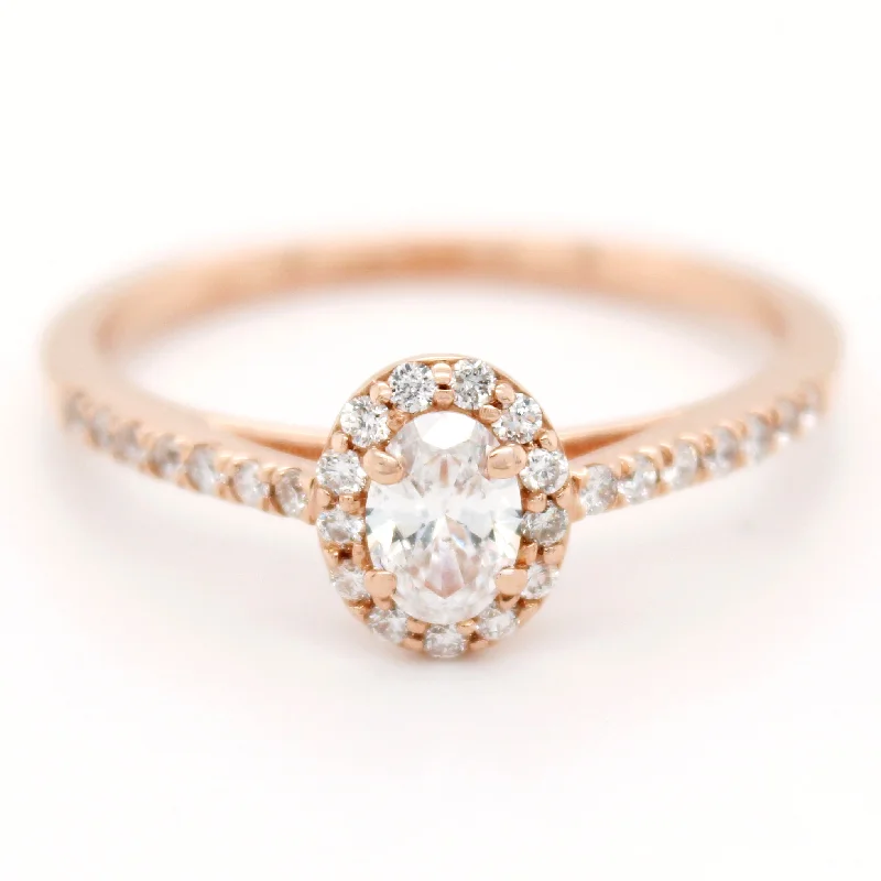 Women’s rings with stretch bands for ease -Vintage 0.60ctw Sparkling Diamond Oval Halo Ring in 14k Rose Gold | Size 7.50