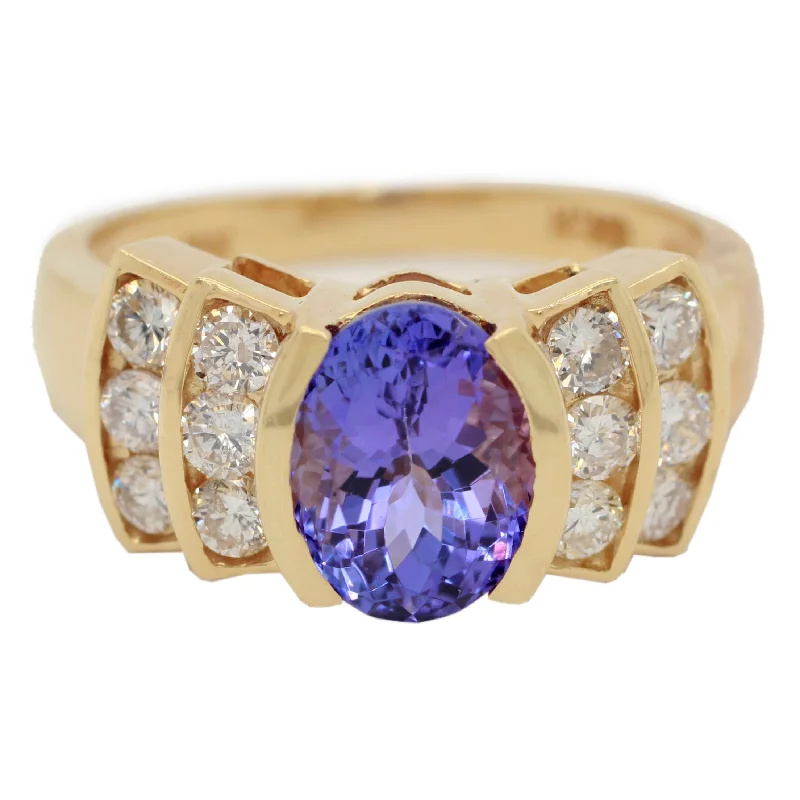 Women’s rings with engraved floral band patterns -1ctw Tanzanite and Diamond Accent Cathedral Style Band Ring - 18k Yellow Gold