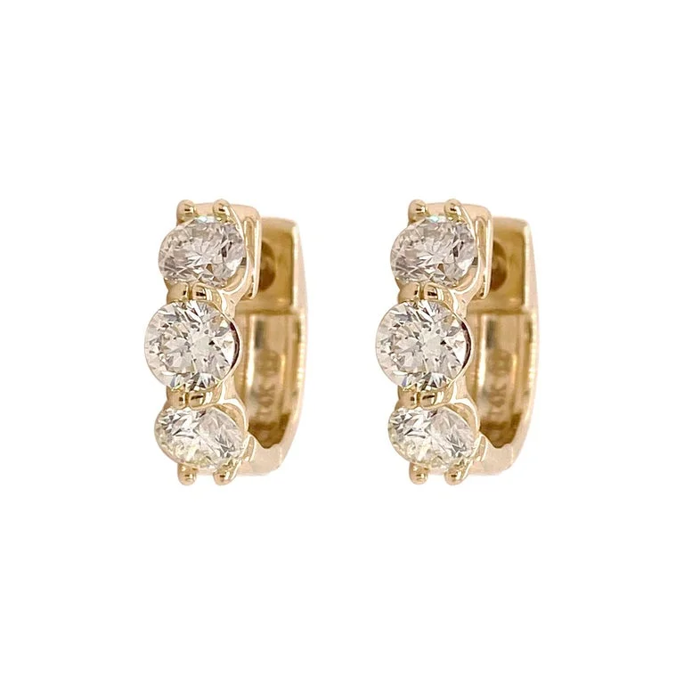 Hoop earrings with oversized pearl accents for a statement-making look-Three Diamond Huggie Earrings