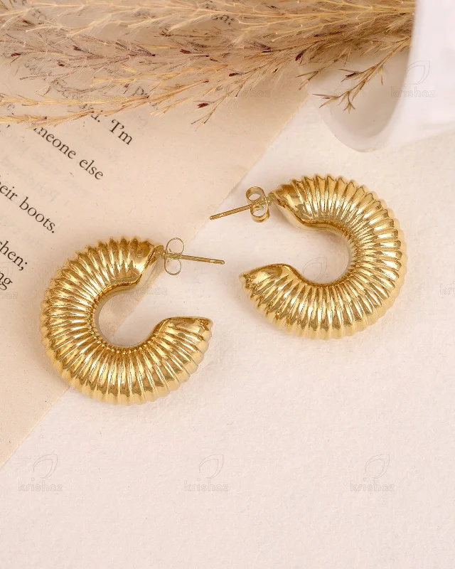 Hoop earrings with satin finishes for a smooth and elegant appearance-Stormi Fashionable Studs