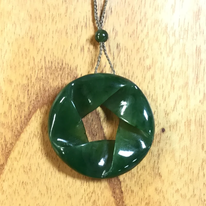 Best necklaces and pendants with sterling silver for an affordable yet stylish choice-Jade Ribbon/Twist Design Pendant